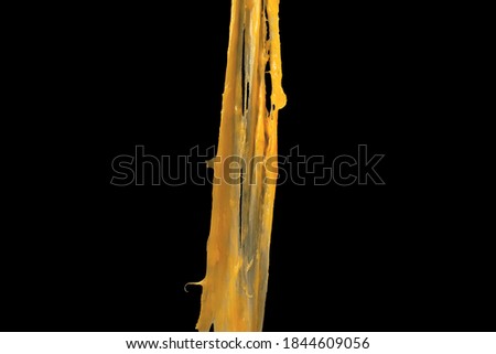 Stretching cheese isolated on black background. Ingredient preparation for design. Melting cheese. Royalty-Free Stock Photo #1844609056
