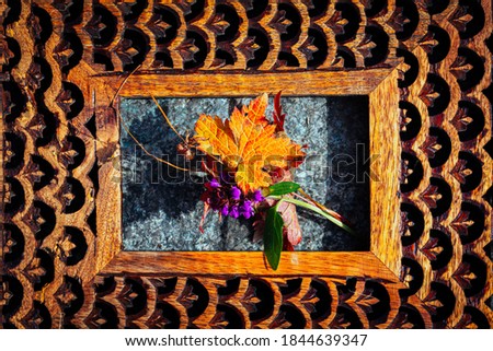 Wooden frame with autumn flowers for posters, banners, wallpapers.
