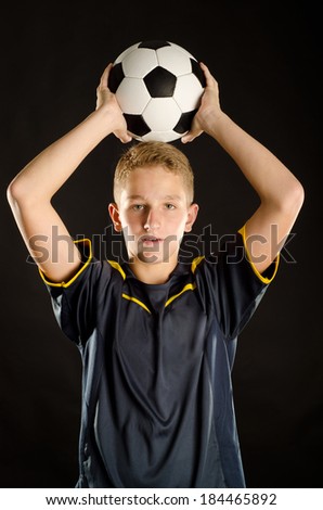 soccer player isolated on a black background