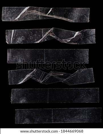 set of transparent adhesive tape or strips isolated on black background, crumpled plastic sticky snips, poster design overlays or elements.
 Royalty-Free Stock Photo #1844669068