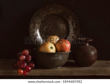 Still life with apples and grape.