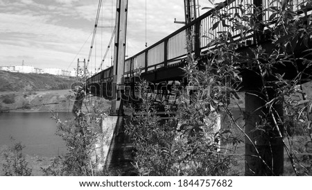 black and white photos in summer pedestrian bridge different viewing angles