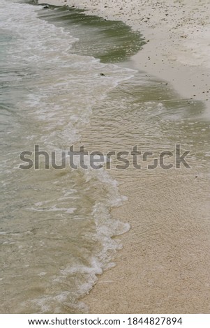 Wave on the beach and sand