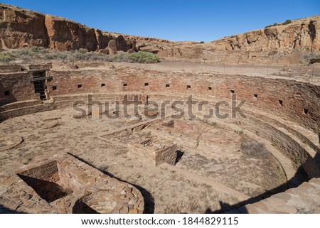 Looking into one  of the ancient Kivas at the Chetro Ketl Great House site built by the Anasazi people in Chaco Canyon, New Mexico. Royalty-Free Stock Photo #1844829115