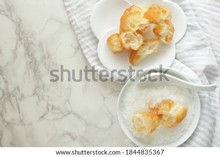 Chinese traditional breakfast, You tiao fried bread on no brand dish
