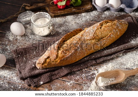 Delicious homemade whole grain baguette with seeds