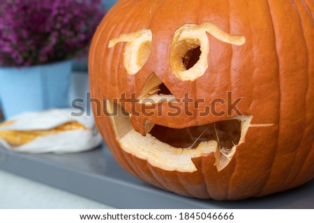 Halloween pumpkin with face - autumn