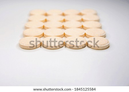effervescent vitamin C tablets on a white background