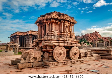 hampi stone chariot the antique stone art piece from unique angle with amazing blue sky image is taken at hampi karnataka india. it is the most impressive and truly splendid architecture in hampi. Royalty-Free Stock Photo #1845146602