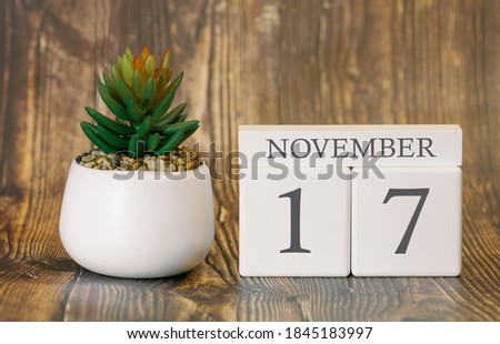 Flower pot and calendar for the fall season from 17 November. Autumn time.