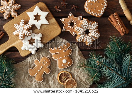 Flat lay composition with delicious homemade Christmas cookies on wooden table