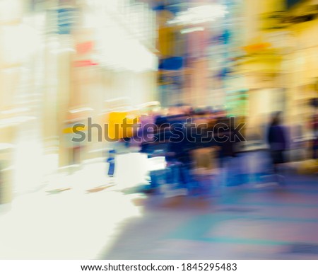 Abstract photography. People walking somewhere in the city