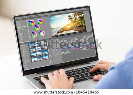 Video Editor Or Designer Using Editing Software Tech On Computer Royalty-Free Stock Photo #1845418465