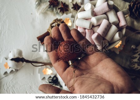 
man holding a christmas toy