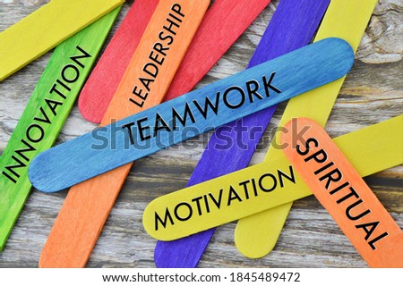 Concept image colorful ice cream stick with word TEAMWORK, LEADERSHIP, MOTIVATION, INNOVATION, SPIRITUAL. Business and education concept.