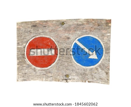 Road signs carved on wood plank, on white background