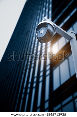  Security surveillance cameras in front of high-rise business district buildings, Shanghai  