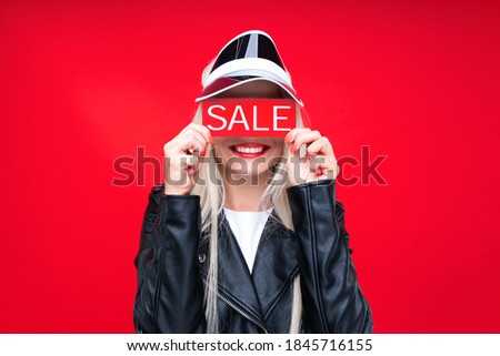 Close up photo beautiful she her lady recommend black friday carry packs paper promotion buy buyer birthday sale discount wear specs formal-wear costume suit isolated red bright background