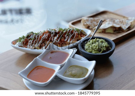 Nachos with Guacamole and Sauce, Mexican Cuisine in Bangkok, Thailand, Asia 