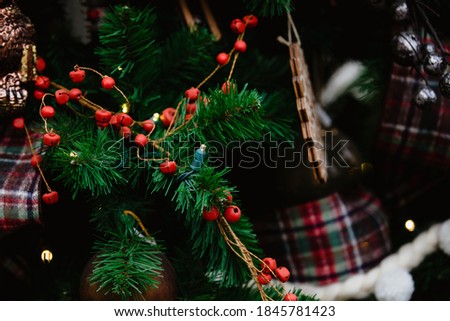Christmas holiday décor with christmas colors and greenery 