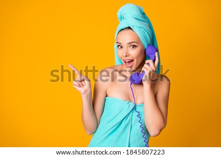 Photo of beautiful lady receive chatting speak tell retro line phone direct finger isolated on yellow color background