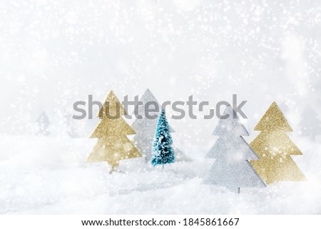 New year holiday concept. White winter snow christmas forest for greeting card. Copy space background