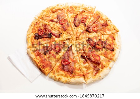 pizza with bacon and chilli pepper