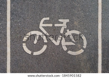 bike lane sign on road