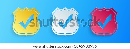 Paper cut Shield with check mark icon isolated on blue background. Protection, safety, security, protect, defense concept. Tick mark approved icon. Paper art style. Vector.