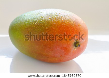 Haden mango green and red color close up Royalty-Free Stock Photo #1845952570