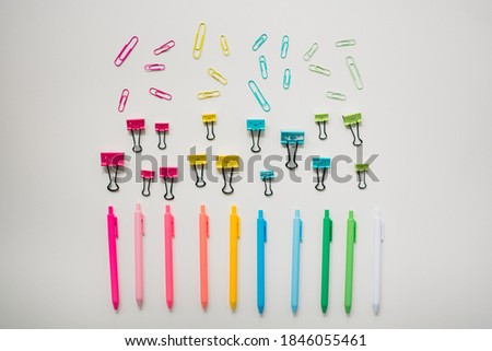 colorful school supplies on plain white table