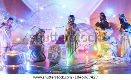 Picture of Christmas bethlehem made of wooden figures, with nice light background