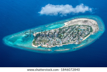 colorful island in MALDIVES FROM THE SKY