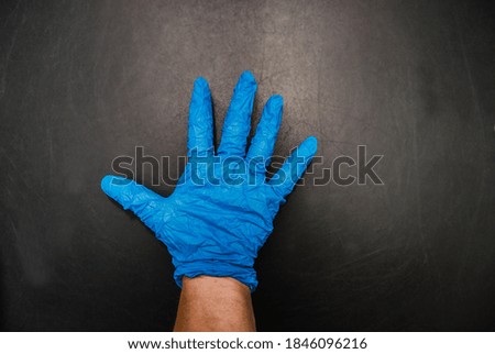hand in a medical glove