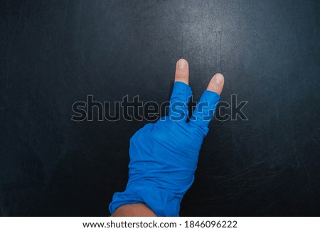 hand in a medical glove