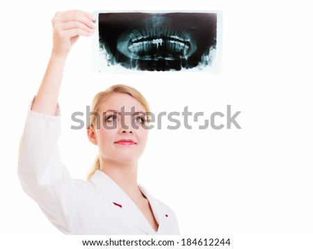 Young woman doctor radiologist in white lab looking at the x-ray isolated. Medical person for health insurance.