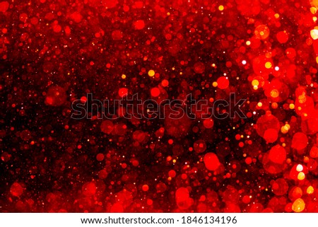 Red bokeh of light textured glitter use for valentine'day background