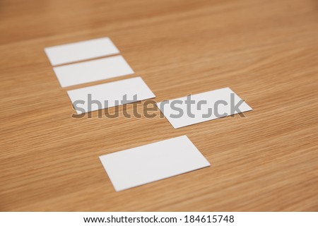 Business card pile on desk