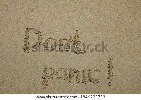 Dont panic concept written on the sand, stress