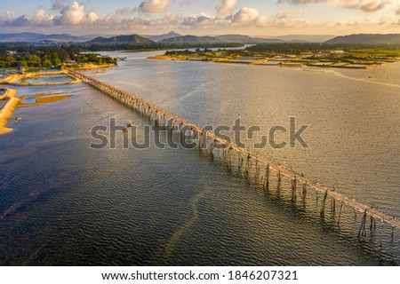 Aerial view of Ong Cop or Mr Tiger wooden bridge at Phu Yen, Vietnam. This is the longest wooden bridge in Vietnam