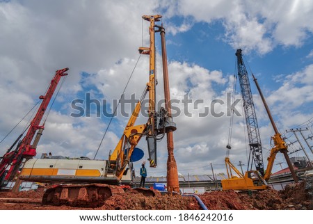 Industrial drilling rig machinery on building construction site.Drilling vehicle construction concrete piles on working Royalty-Free Stock Photo #1846242016