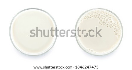 Glass of milk isolated on white background. From top view. Royalty-Free Stock Photo #1846247473