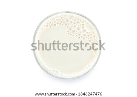 Glass of milk isolated on white background. From top view. Clipping path. Royalty-Free Stock Photo #1846247476