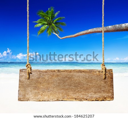 Wooden Board Hanging on a Beach