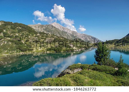 Hiking to Banderitsa lakes, view across the lakes of the Pirin Mountains in Bulgaria with Muratovo, Ribnoto, National Park Pirin Royalty-Free Stock Photo #1846263772