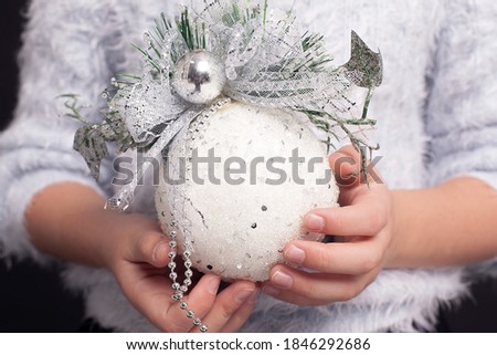 Christmas New Year set with christmas ball in hand