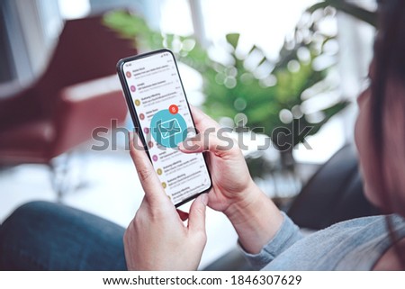 Woman recieve inbox view the pending e-mail communication at home, New messages on mobile smartphone at home. Royalty-Free Stock Photo #1846307629