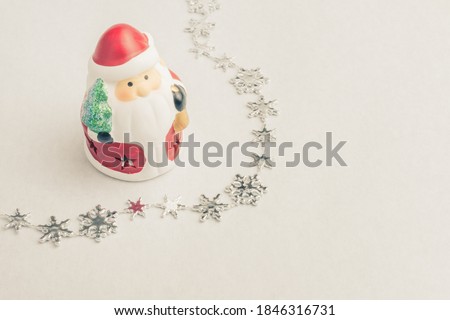 A Cute Santa Claus Ornament on The White Background,  Xmas or Christmas Image, Ornament