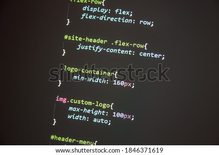 Wordpress theme code close up. Laptop screen with CSS code