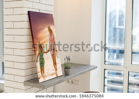 wall art photo canvas in room interior.